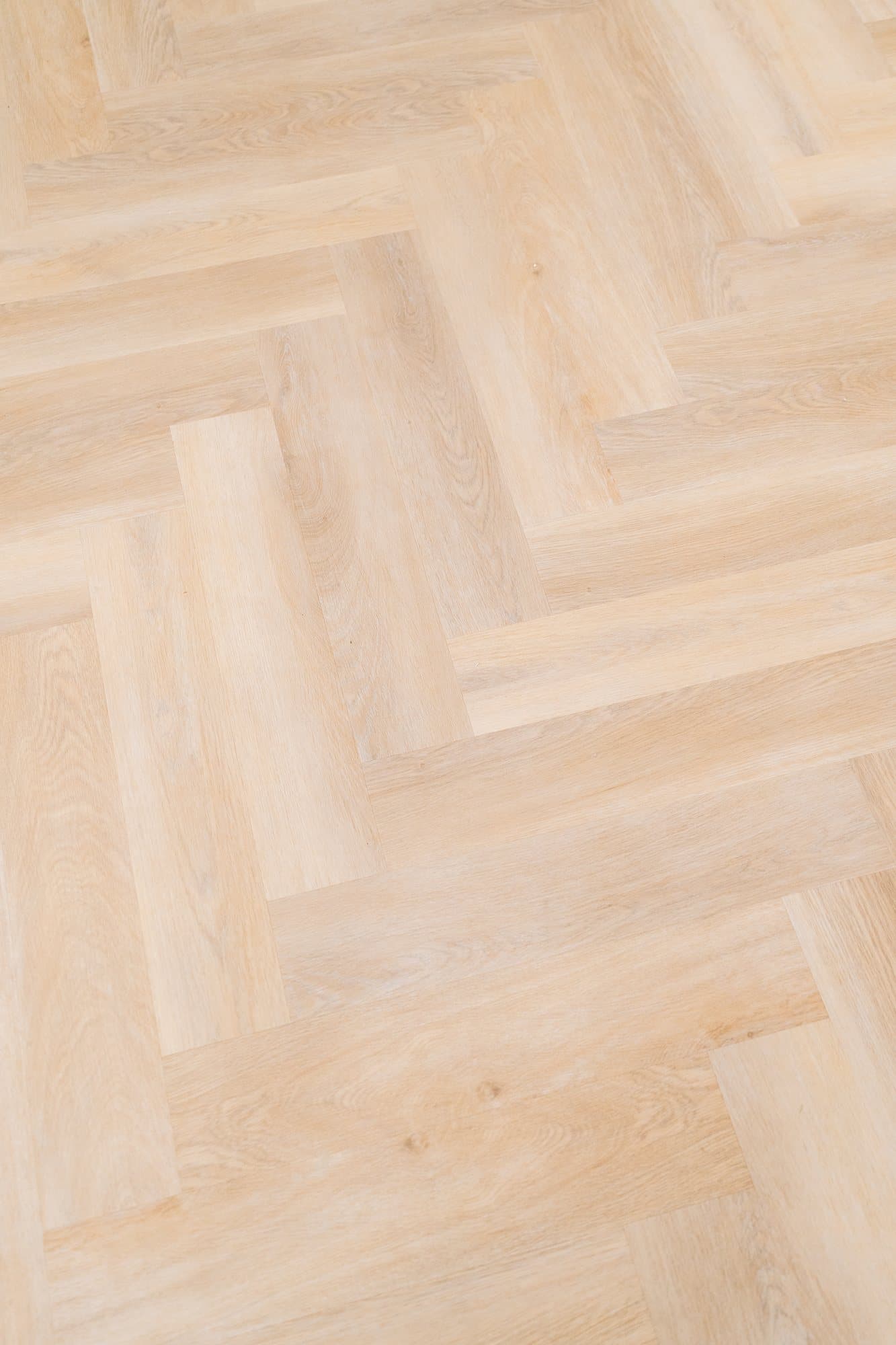 Close view of a white oak herringbone floor